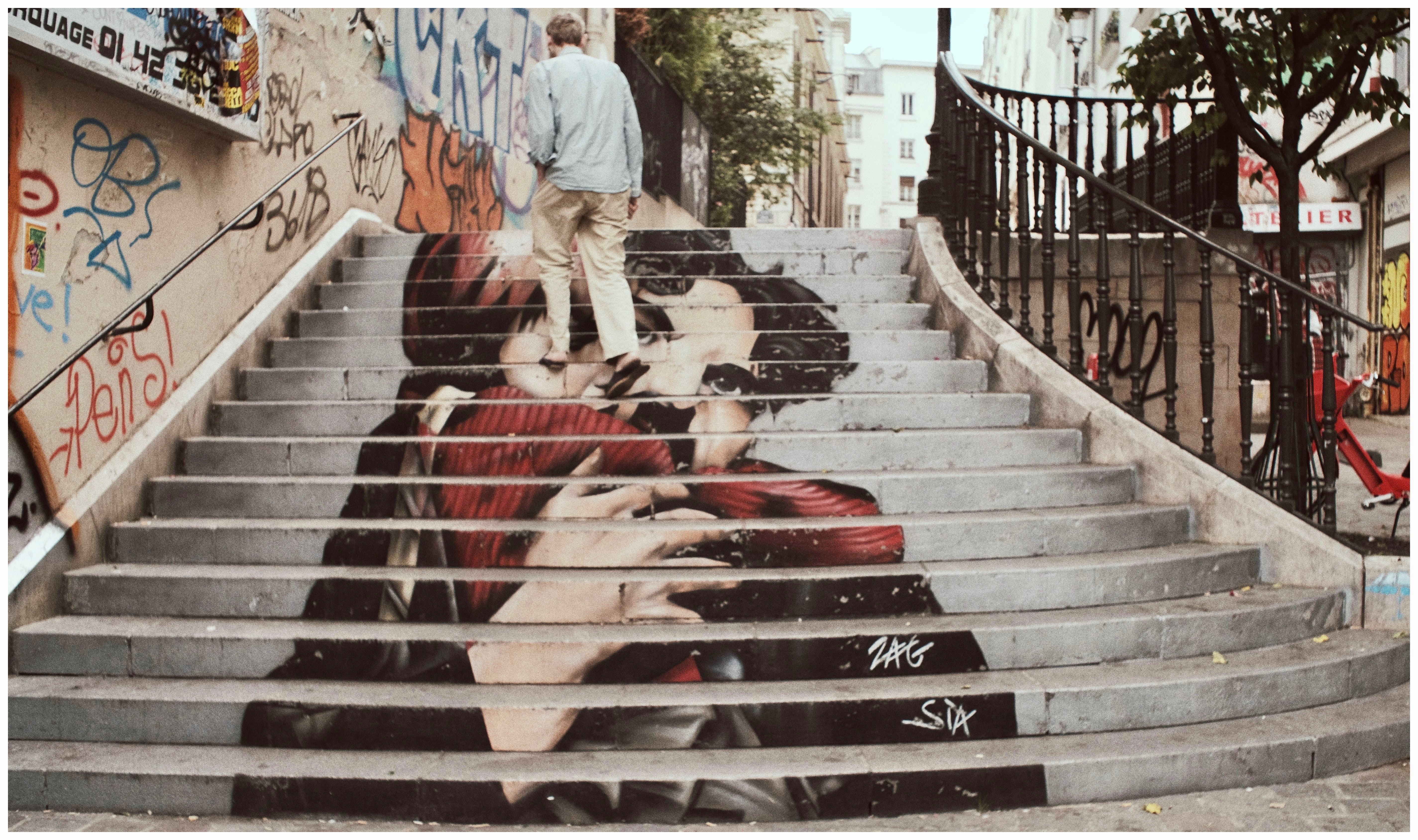 man-stepping-on-staircase-2767742.jpg?time=1708958277442